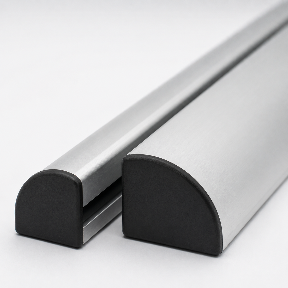 Black ABS plastic end cap fitted to the end of a 40 Series curved aluminium T-slot / V-slot extrusion